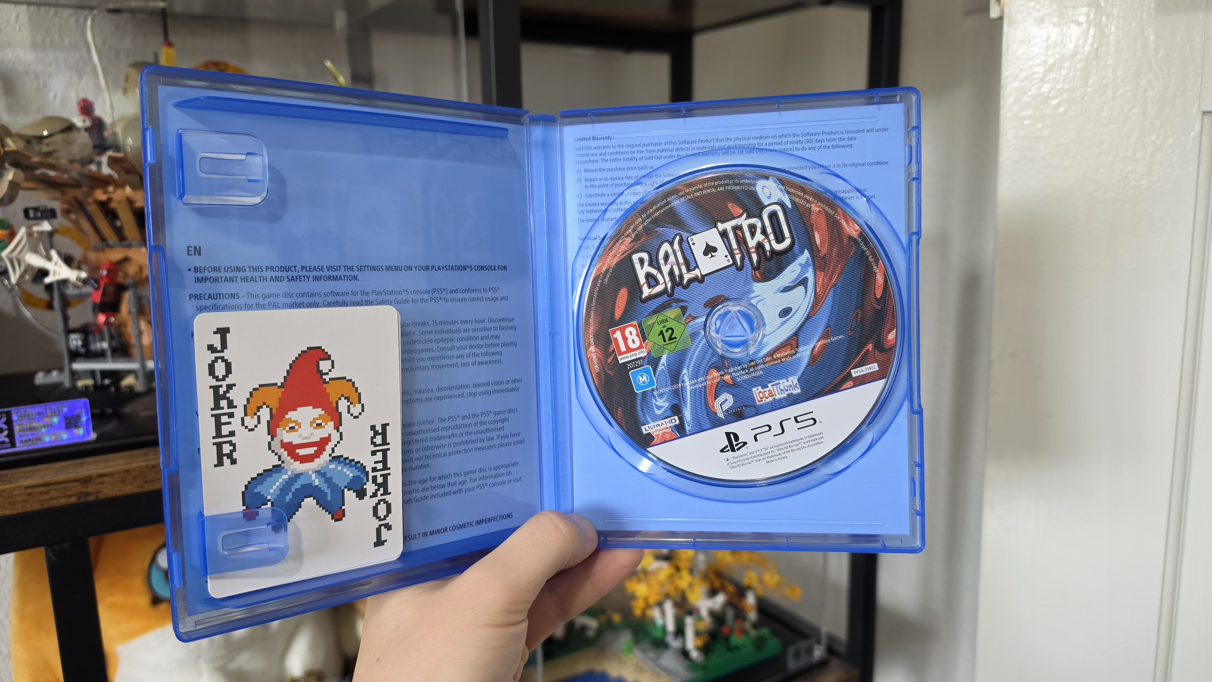 Inside the physical copy of Balatro for PS5.