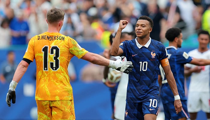 Frances Kylian Mbappé with England goalkeeper Dean Henderson after the FIFA World Cup third place playoff at Miami Stadium, Miami Gardens, United States, July 18, 2026. – Reuters