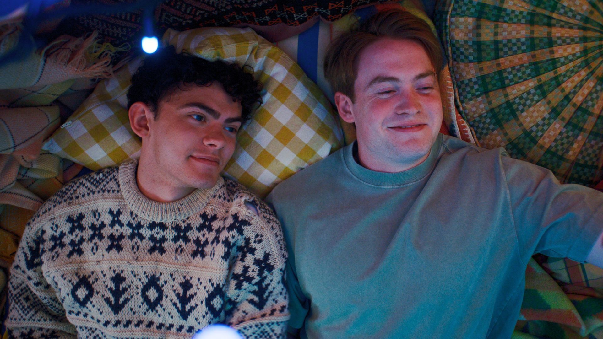 Nick and Charlie find themselves in a bed.