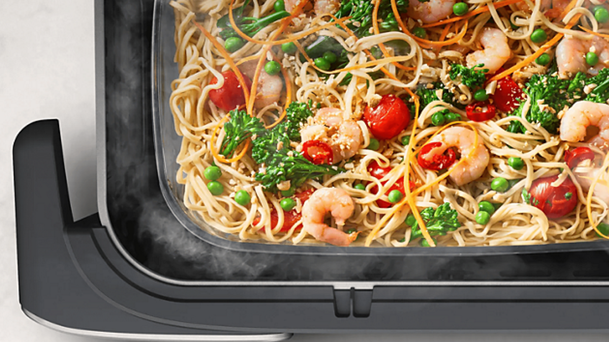 Product photo of the Megabasket Philips Airfryer 5000 series with steam inlet from above showing steamed food