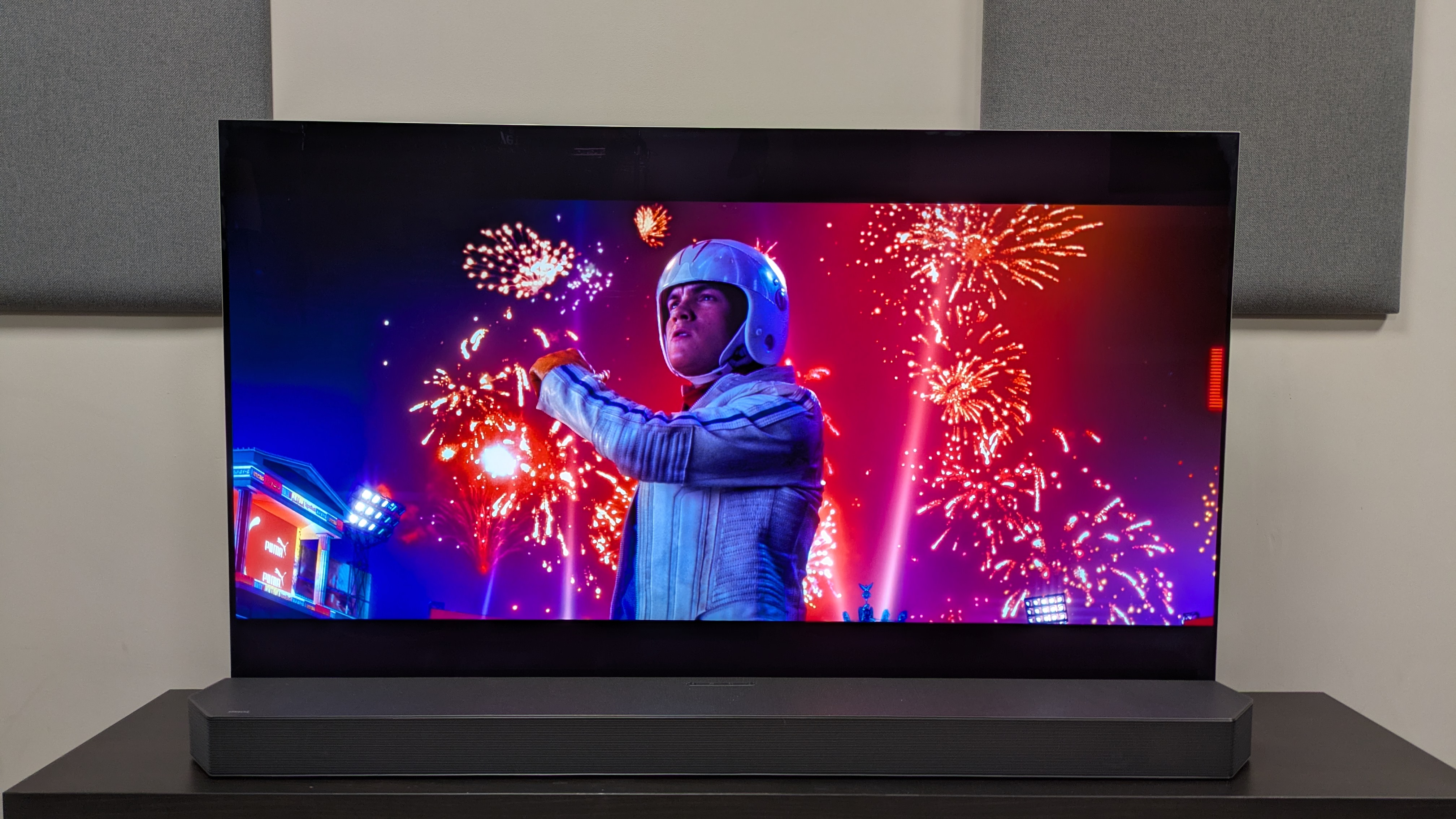 Speed ​​Racer 4K Blu-ray on LG G5 showing Speed ​​Racer standing in front of some brilliant fireworks