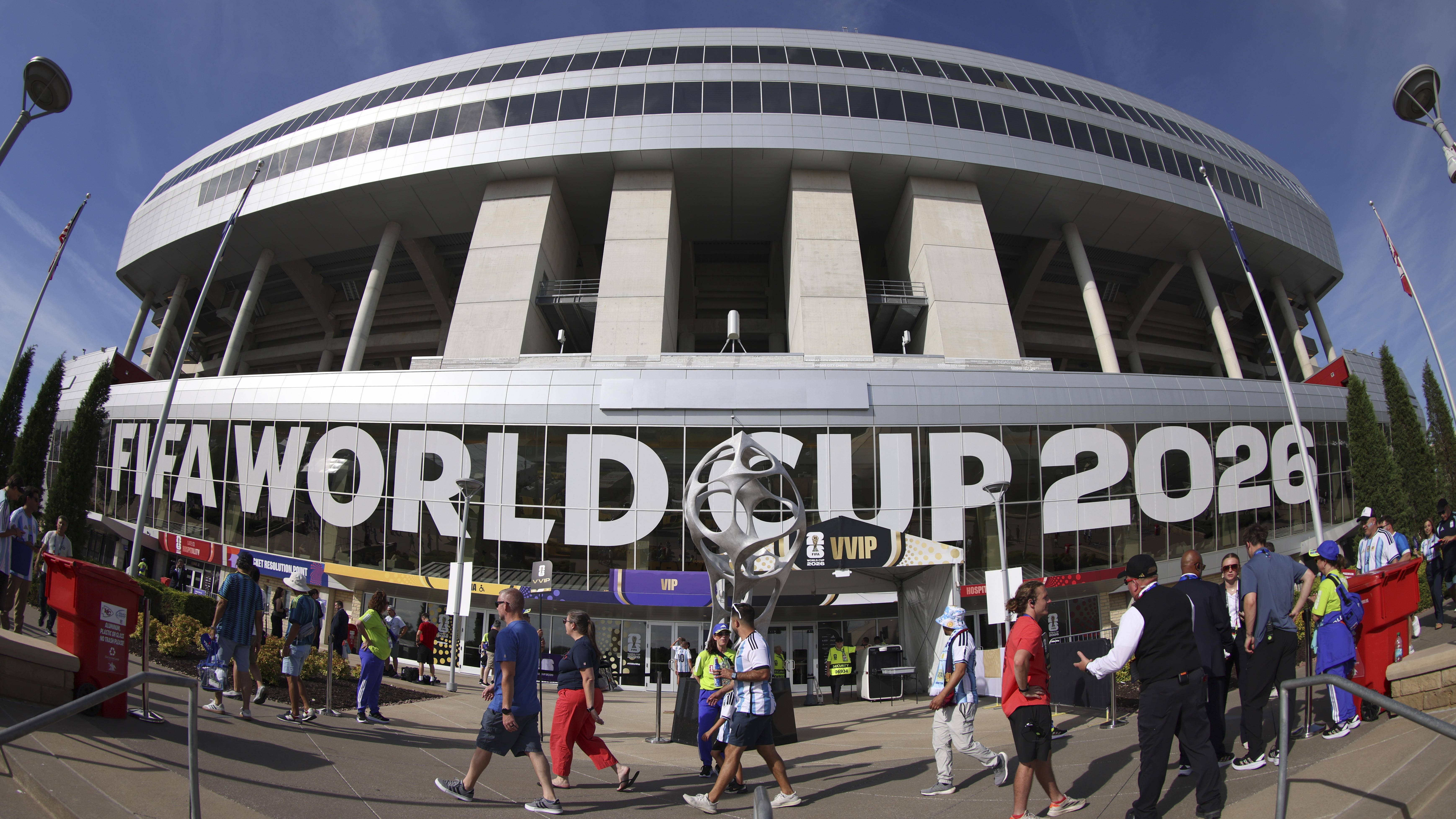 The exterior of a 2026 World Cup stadium with people walking